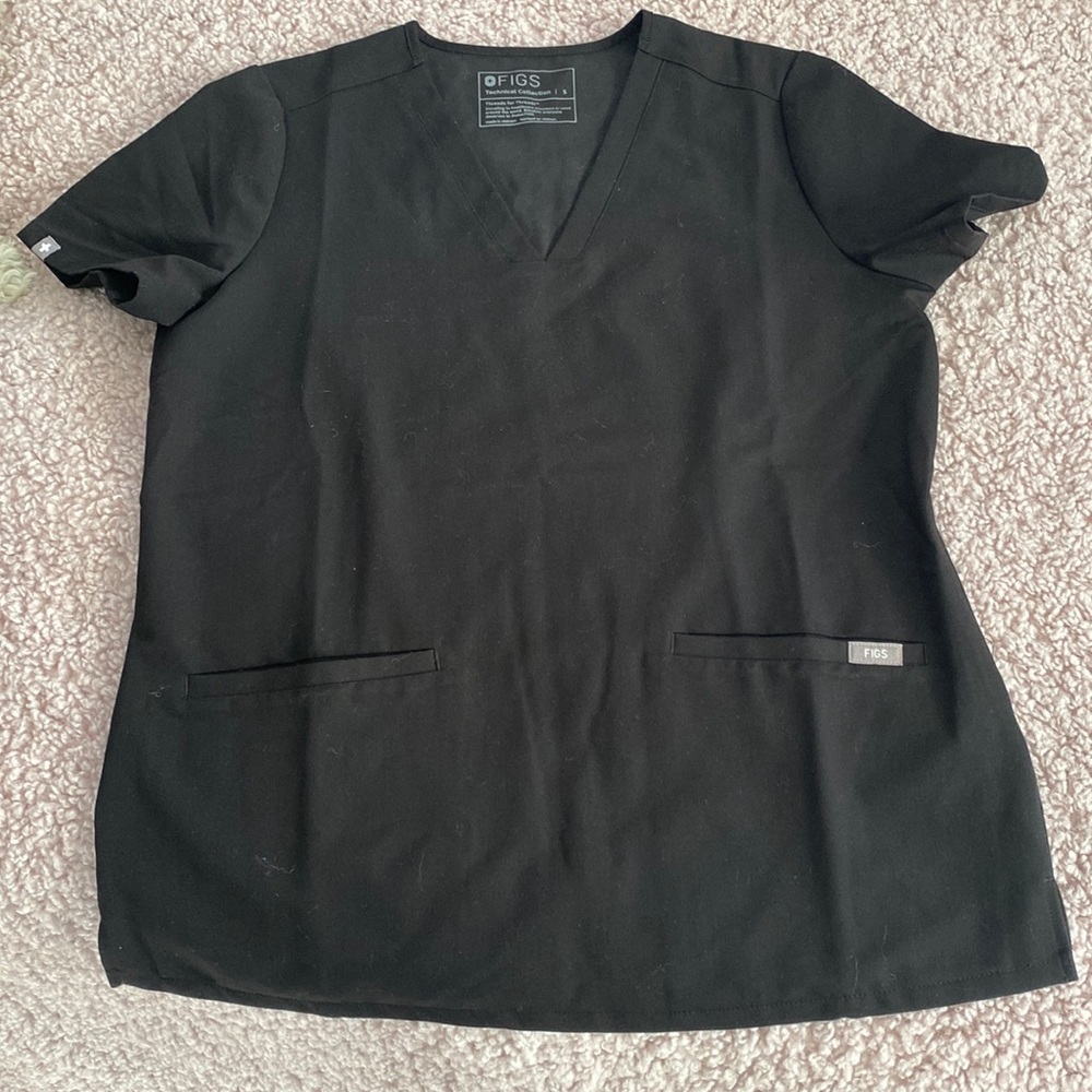 Figs scrub top worn a few times. No stains or tear. Great condition